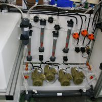 Detailed view on water distribution and recirculation pumps