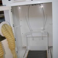 200 liters acid drums cleaning and drying equipment. Detailed view on drum load/unload station.