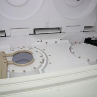 Detailed view on process chambers with floating effect and slides between process to avoid wafer air contact.