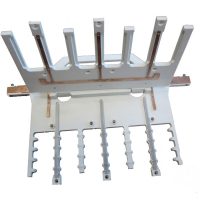 Multiple strip holder for plating equipment with integrated electric contact.
