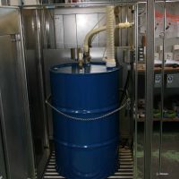 Detailed view on 200 liters drum for waste chemical collection.