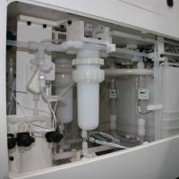Detailed view on hydric group, configured with magnetic levitation pumps, 10in filter housings and 2 heated buffer tanks.